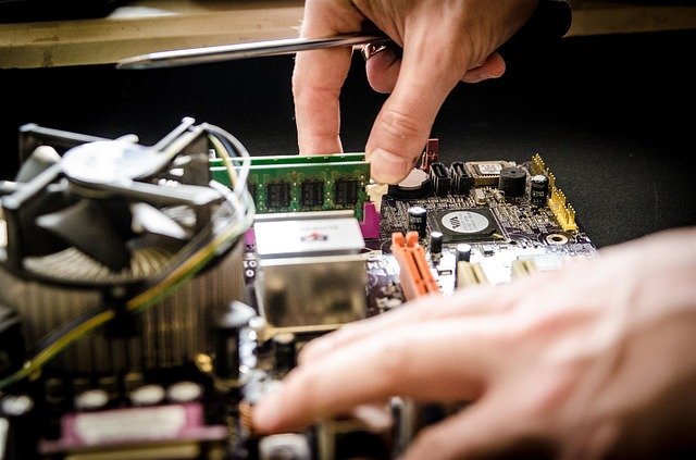 repairing a motherboard in-shop repair